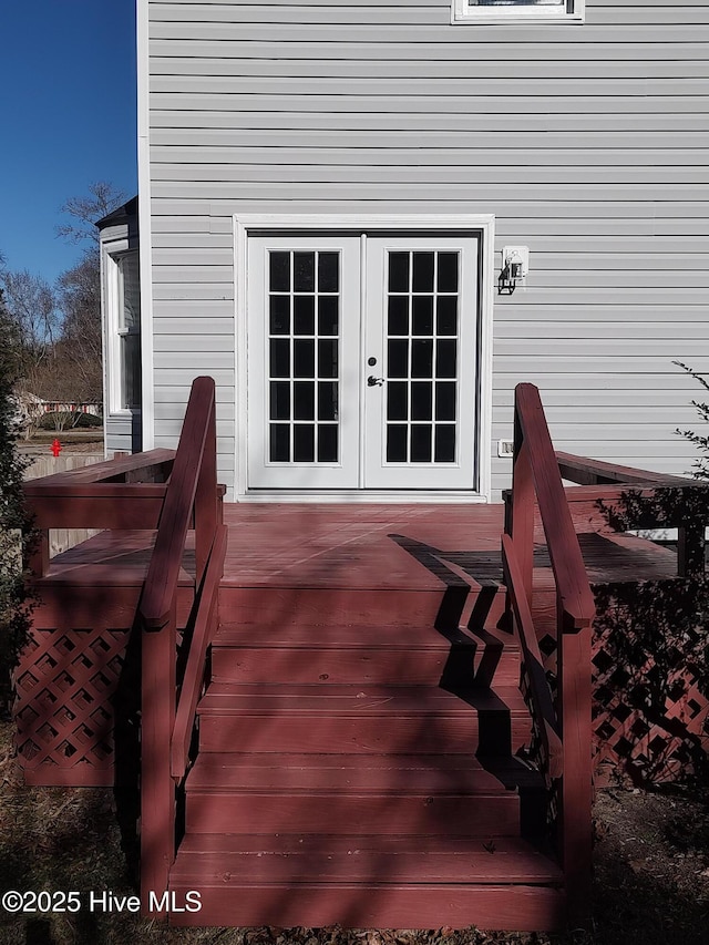 wooden terrace featuring french doors