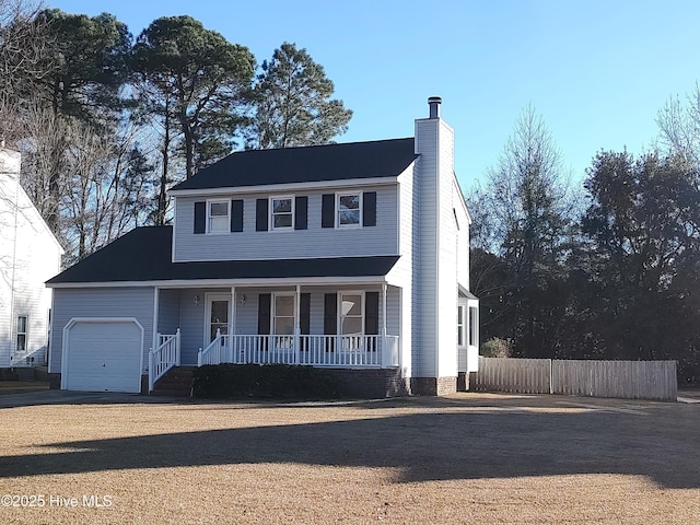 view of front facade featuring a garage and covered porch