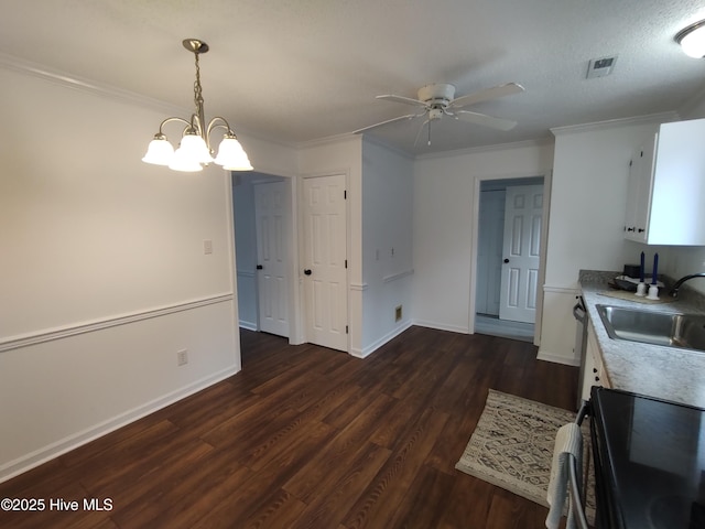 kitchen with dark wood-type flooring, sink, white cabinetry, ornamental molding, and electric stove