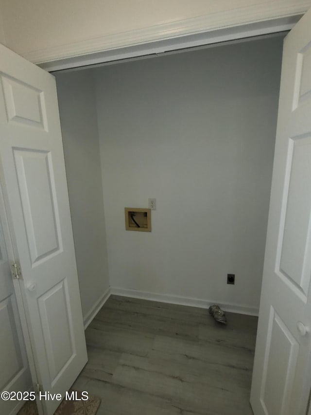 washroom featuring hookup for a washing machine, hookup for an electric dryer, and light wood-type flooring