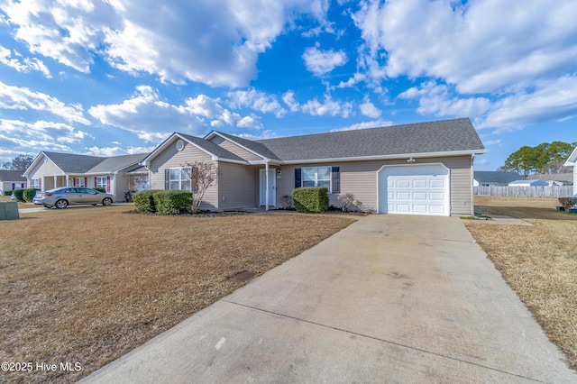 ranch-style home featuring a garage and a front yard