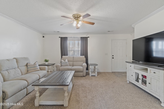 living room featuring ceiling fan, ornamental molding, light carpet, and a textured ceiling