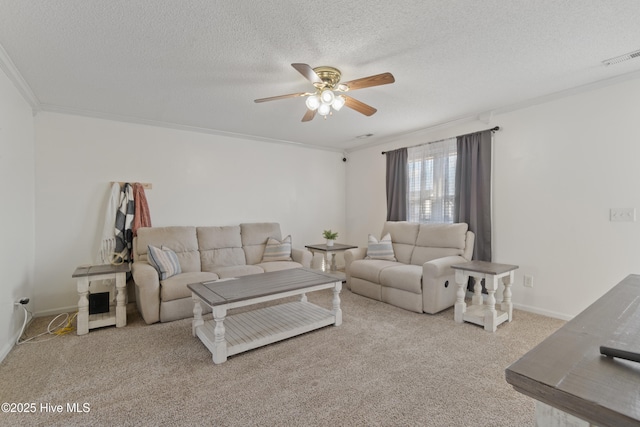 carpeted living room featuring ceiling fan, ornamental molding, and a textured ceiling