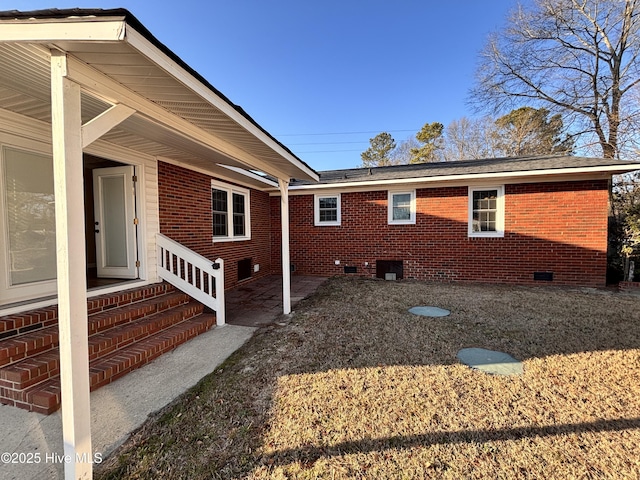 view of home's exterior with a patio area