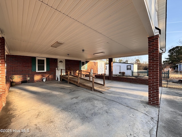 view of patio featuring a carport