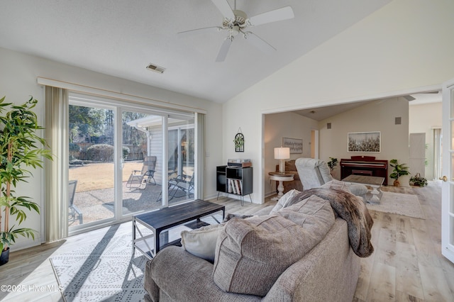 living room with pool table, vaulted ceiling, ceiling fan, and light wood-type flooring