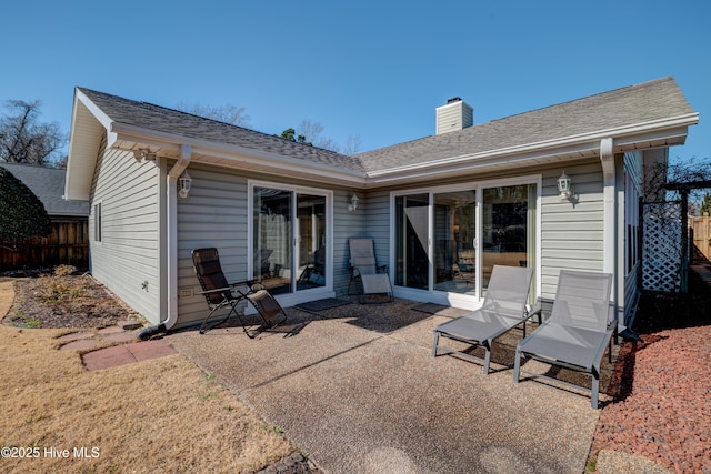 back of property with a patio area