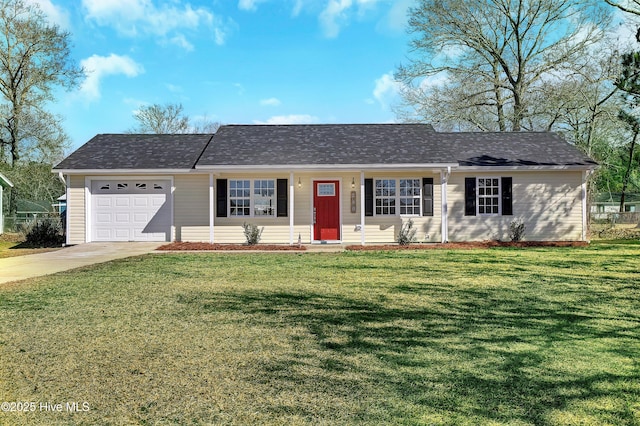 single story home featuring a garage and a front lawn