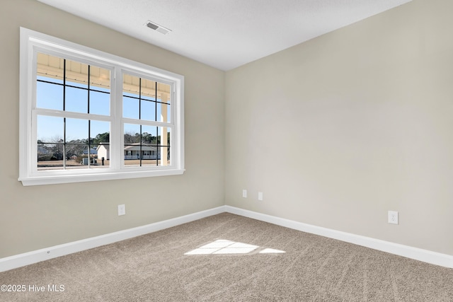 empty room featuring carpet