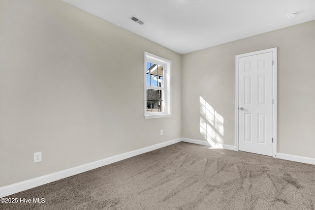 spare room with carpet flooring