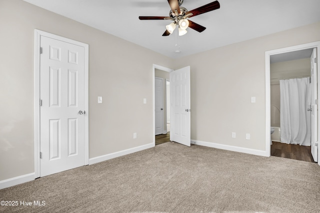 unfurnished bedroom featuring ceiling fan and carpet