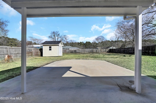 view of patio / terrace with a shed