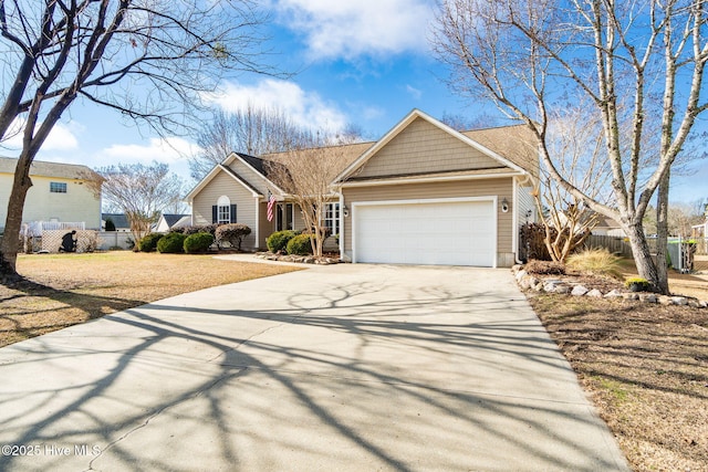 view of front of house with a garage and a front lawn