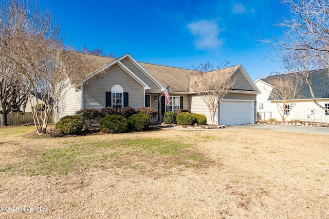 single story home featuring a garage and a front lawn