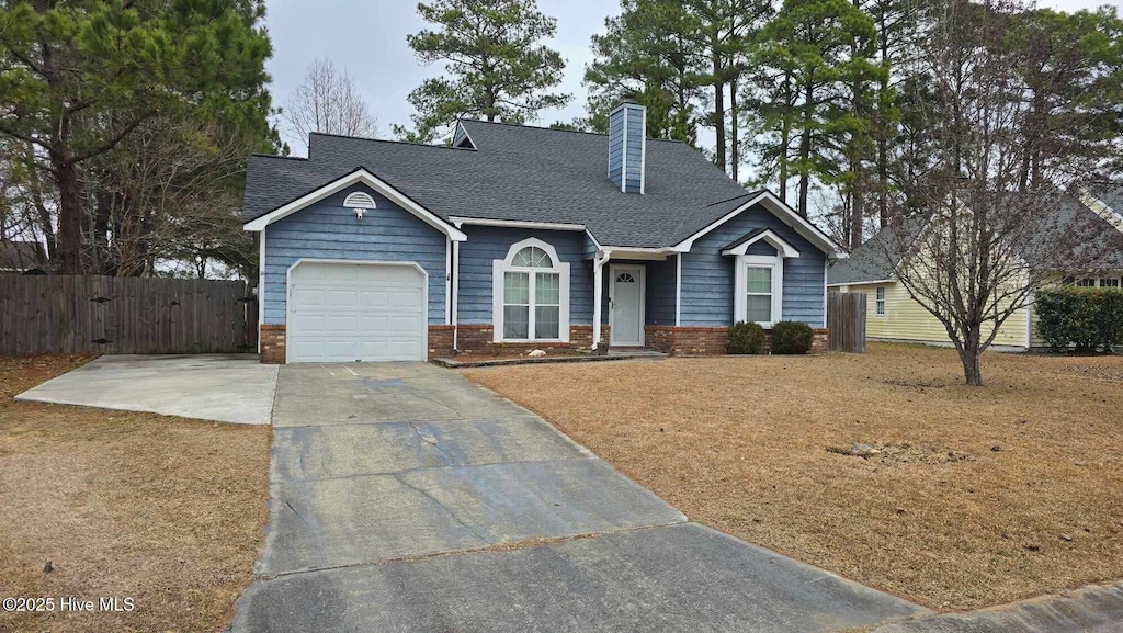 cape cod-style house with a garage