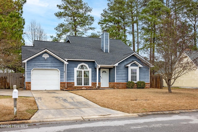 new england style home featuring a garage