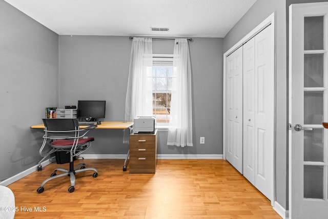 office space featuring light hardwood / wood-style floors