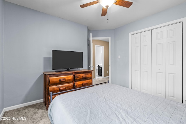 bedroom with light carpet, a closet, and ceiling fan