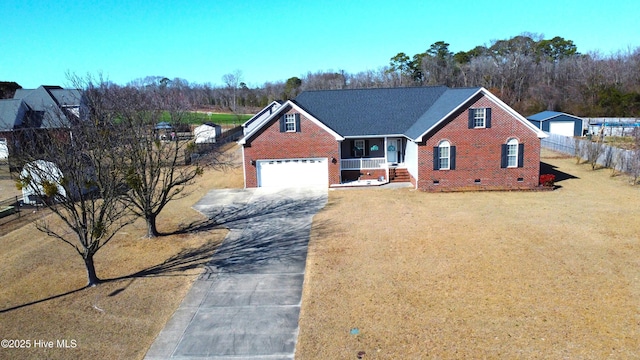 view of front facade with a garage and a front lawn