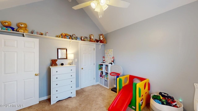 playroom featuring lofted ceiling, light colored carpet, and ceiling fan