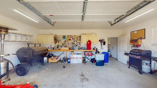 garage featuring a workshop area