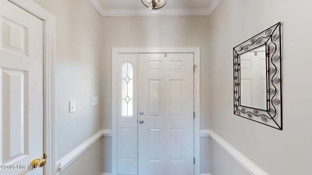 foyer entrance featuring ornamental molding