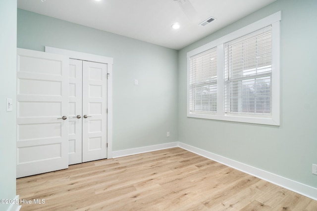 unfurnished room featuring light hardwood / wood-style floors