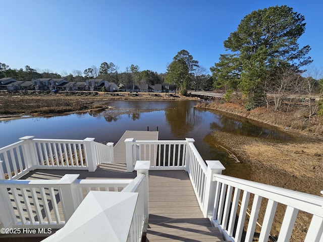 dock area with a water view