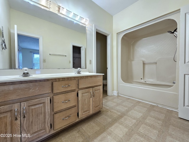 full bathroom featuring vanity, shower / bathing tub combination, and toilet