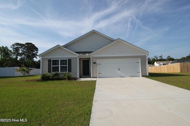 400 King Creek Dr, Havelock, NC 28532 - single story home featuring an attached garage, fence, driveway, and a front lawn