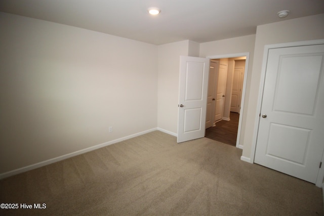 400 King Creek Dr, Havelock, NC 28532 - unfurnished bedroom with baseboards and carpet flooring