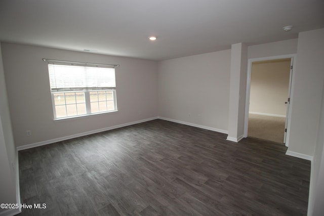 400 King Creek Dr, Havelock, NC 28532 - unfurnished room with baseboards, recessed lighting, and dark wood-type flooring