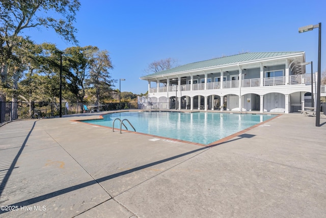 view of pool featuring a patio