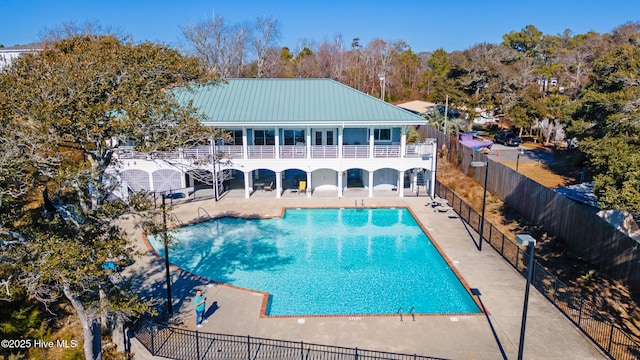 view of swimming pool featuring a patio