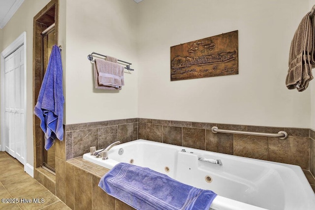 bathroom with tile patterned floors and plus walk in shower