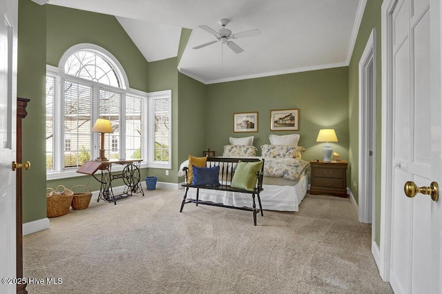 bedroom featuring multiple windows, ornamental molding, lofted ceiling, and light carpet