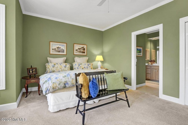 bedroom featuring light carpet, ensuite bath, ornamental molding, and ceiling fan