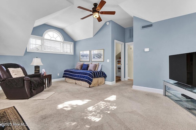 carpeted bedroom featuring ceiling fan and vaulted ceiling