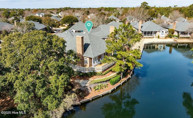 bird's eye view with a water view