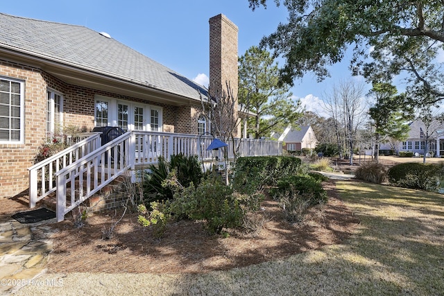 view of yard with a deck