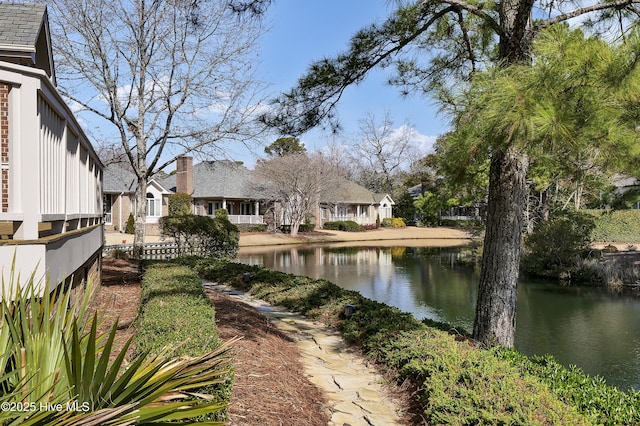 exterior space with a water view