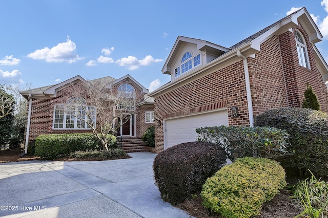 front of property with a garage