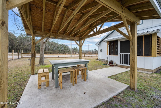 view of patio / terrace with a sunroom