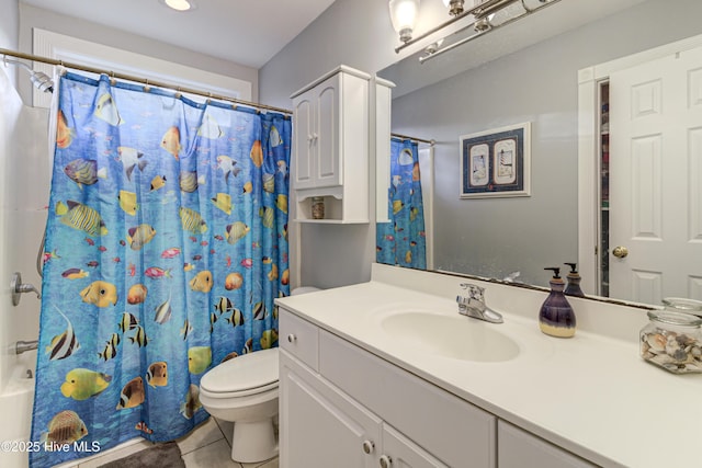 full bathroom featuring tile patterned flooring, vanity, shower / tub combo, and toilet