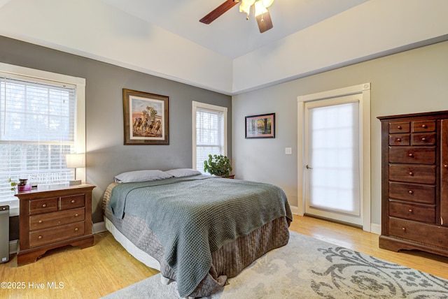 bedroom with ceiling fan and light hardwood / wood-style flooring