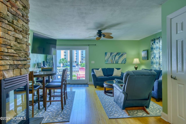 1981 New River Inlet Rd, North Topsail Beach, NC 28460 - living room with ceiling fan and wood-type flooring