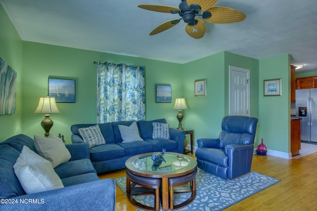 1981 New River Inlet Rd, North Topsail Beach, NC 28460 - living room featuring light wood-style flooring and a ceiling fan