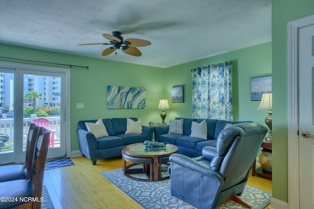 1981 New River Inlet Rd, North Topsail Beach, NC 28460 - living area featuring light wood-style floors and ceiling fan