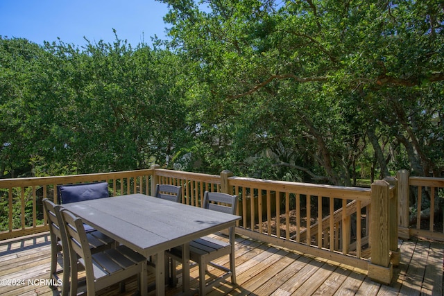 1981 New River Inlet Rd, North Topsail Beach, NC 28460 - wooden terrace with outdoor dining area