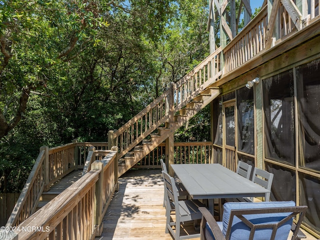 1981 New River Inlet Rd, North Topsail Beach, NC 28460 - deck with stairs and outdoor dining space